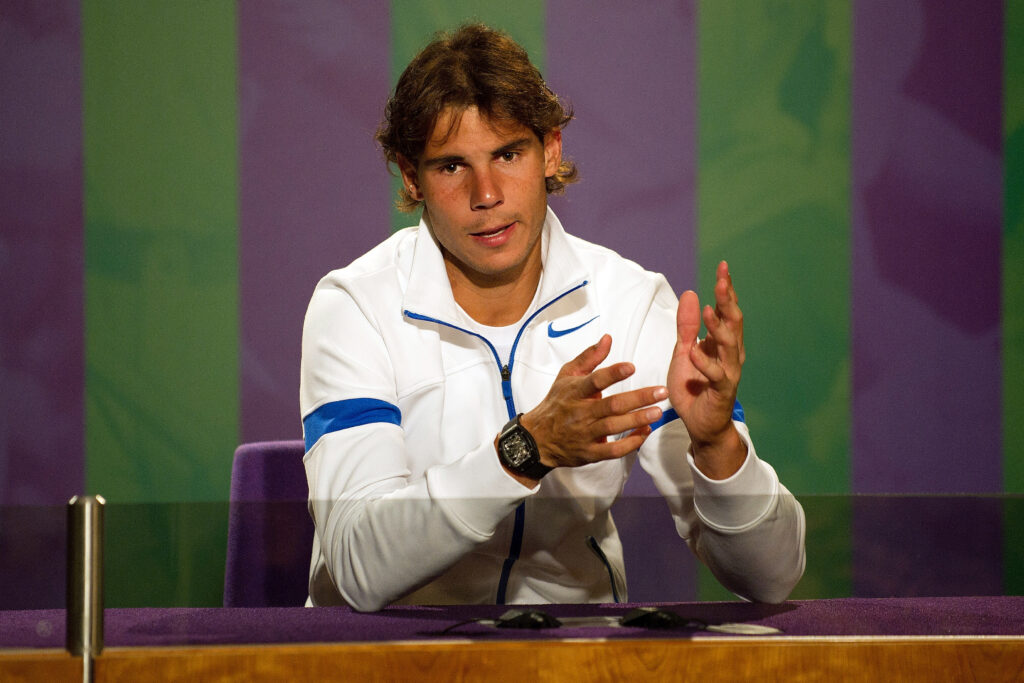 Rafael Nadal speaks to the media during the 2011 Wimbledon Championships
