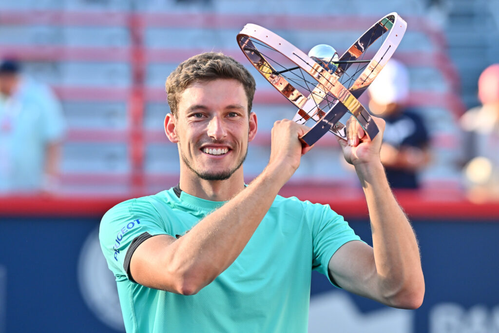 Pablo Carreno Busta celebrates with the Canadian Open title in 2022