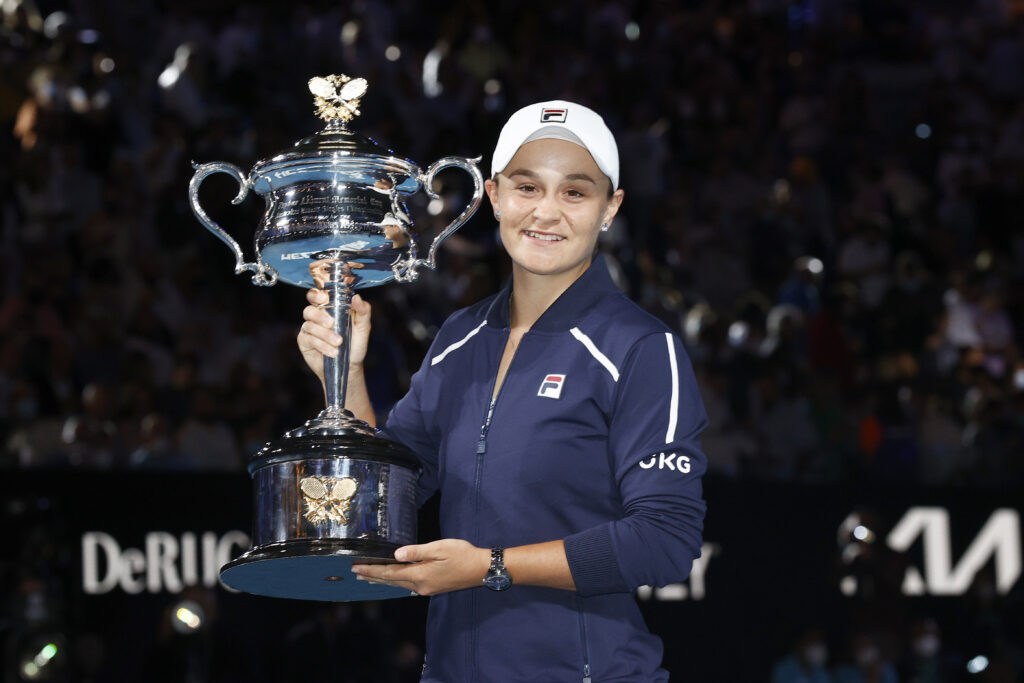 Ash Barty poses with the Australian Open trophy after beating Danielle Collins in the 2022 final.