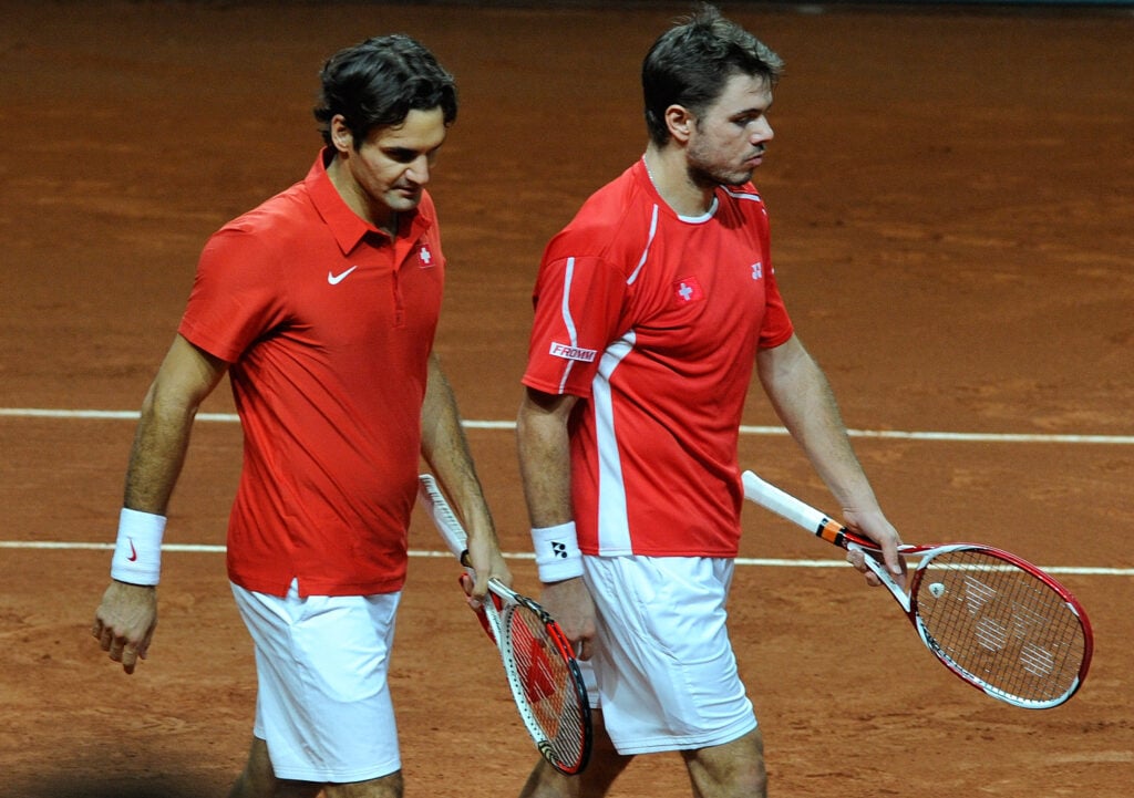 Roger Federer and Stan Wawrinka in action at the Davis Cup in 2012.