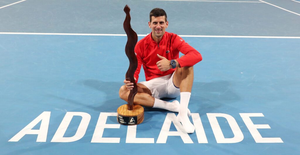 Novak Djokovic posing with the trophy after winning the Adelaide International title in 2023.