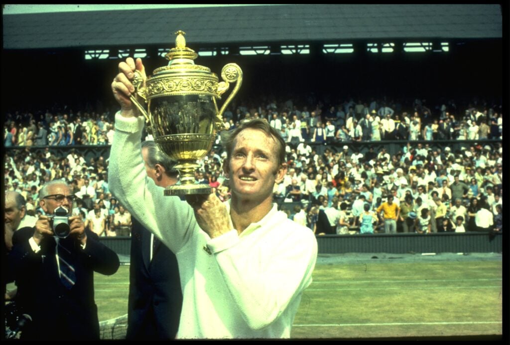 Rod Laver celebrates with the Wimbledon title in 1969