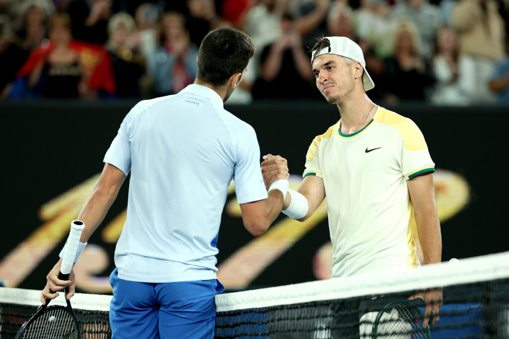 Novak Djokovic embraces Dino Prizmic at the 2024 Australian Open.
