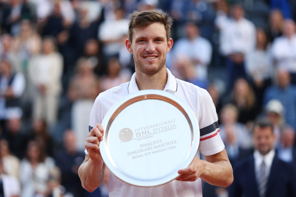 Nicolas Jarry posing with the trophy after finishing as runner-up at the 2024 Italian Open.
