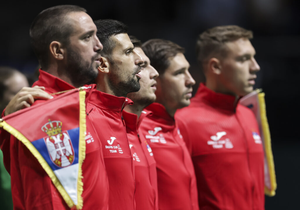 Serbia's Davis Cup team led by captain Viktor Troicki, Novak Djokovic, Miomir Kecmanovic, Dusan Lajovic and Hamad Medjedovic sing national anthem ahead of tie against Greece in 2024.