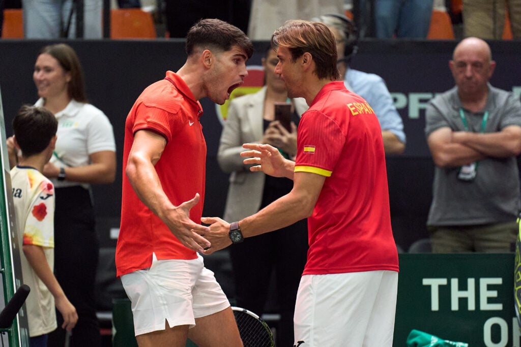 David Ferrer and Carlos Alcaraz celebrate.