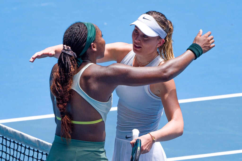 Paula Badosa (R) of Spain embraces Coco Gauff (L) of the United States after victory in the Women's Singles Quarterfinal match during day 10 of the 2025 Australian Open at Melbourne Park on January 21, 2025 in Melbourne, Australia.