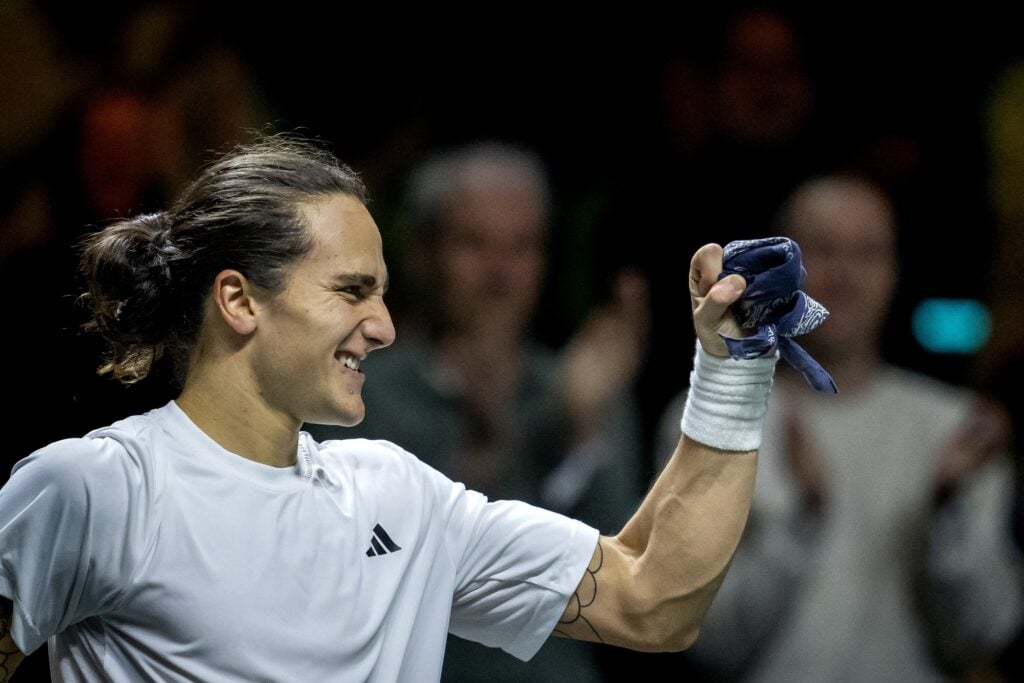 Mattia Bellucci celebrates his win over Stefanos Tsitsipas at the 2025 Rotterdam Open