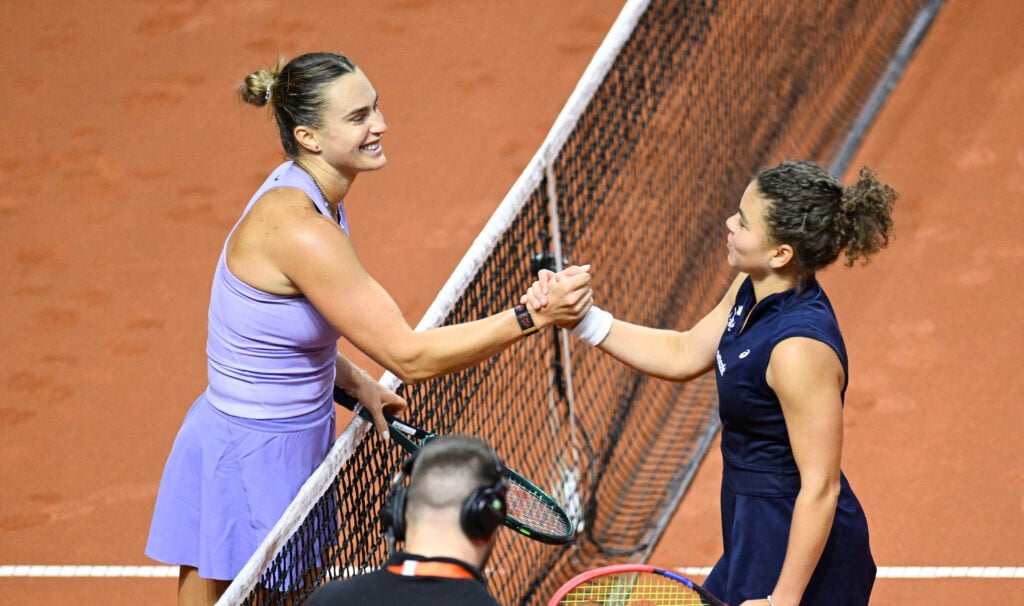 Italy's Jasmine Paolini (R) congratulates Belarus' Aryna Sabalenka after their semi-final match at the Women's Tennis Grand Prix WTA tournament in Stuttgart, southwestern Germany, on April 20, 2025.
