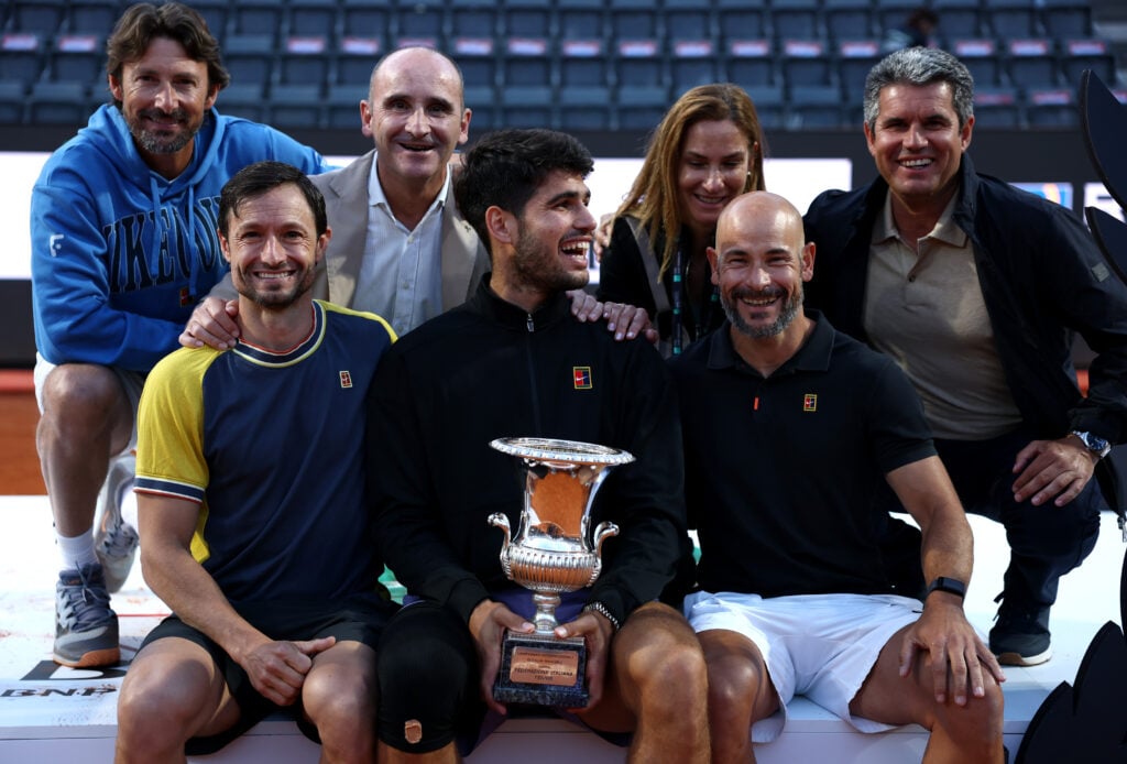 Carlos Alcaraz poses with his team and the Italian Open trophy