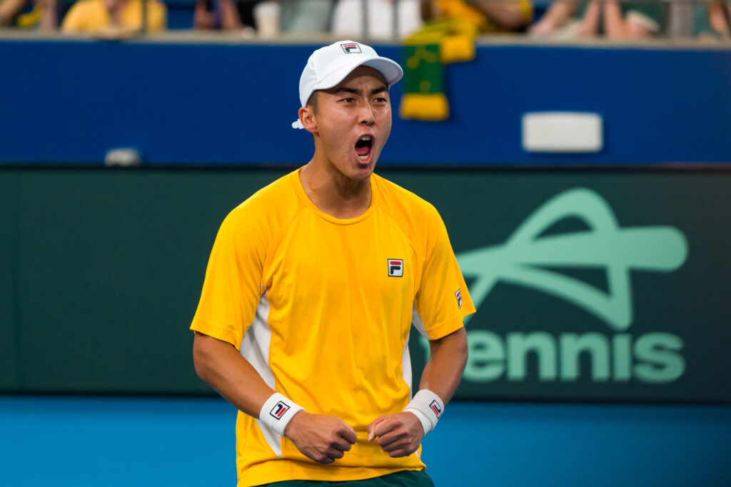 Rinky Hijikata celebrates after win in doubles match alongside Jordan Thompson in Australia's Davis Cup Qualifier against Belgium in Sydney.