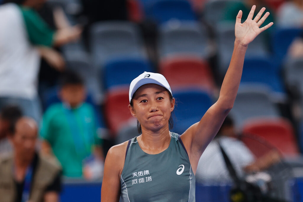 Zhang Shuai waves to the crowd after beating Emma Navarro at the 2025 Wuhan Open.