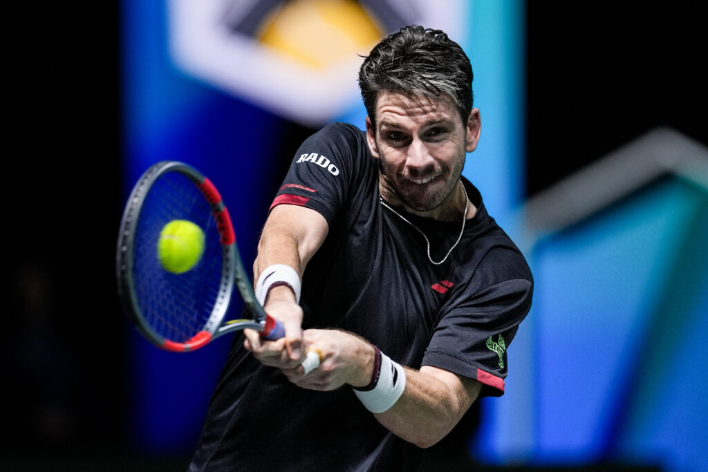 Cameron Norrie plays a backhand against Valentin Vacherot at the 2025 Paris Masters.