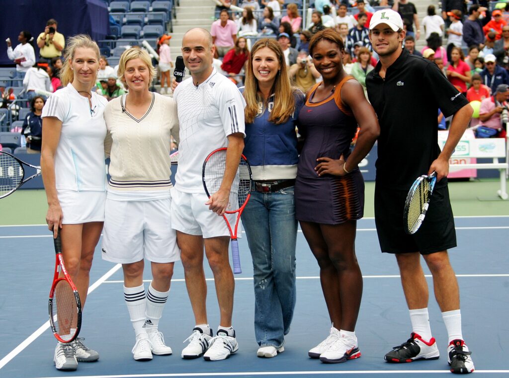 Steffi Graf, TV personality Ellen Degeneres, tennis star Andre Agassi, Daisy Fuentes, Serena Williams and Andy Roddick participate in a charity tennis event on Arthur Ashe Kid's Day ahead of the 2006 US Open.