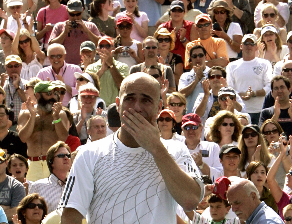 Andre Agassi appears emotional after losing to Benjamin Becker at the 2006 US Open.