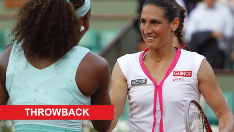 Image of Virginie Razzano and Serena Williams shaking hands after their first-round match at the 2012 French Open