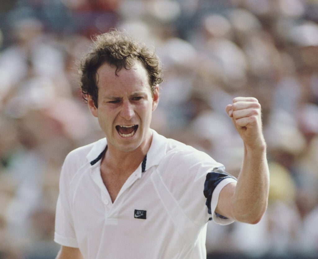 John McEnroe reacts.