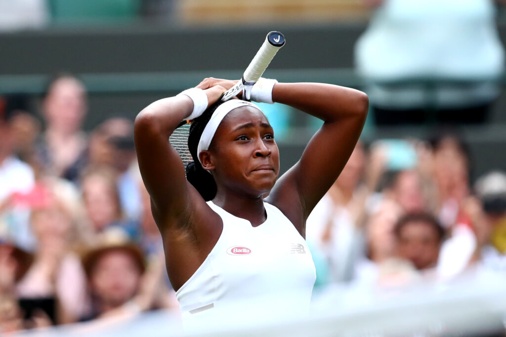 Coco Gauff celebrates after beating Venus Williams at Wimbledon in 2019