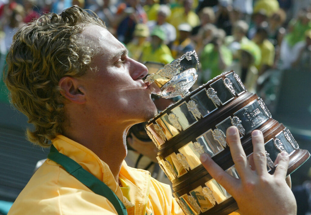 Lleyton Hewitt kisses the Davis Cup trophy in 2003