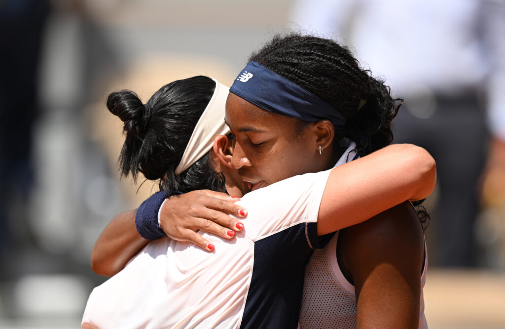 Coco Gauff and Ons Jabeur embrace after their match at the 2024 French Open
