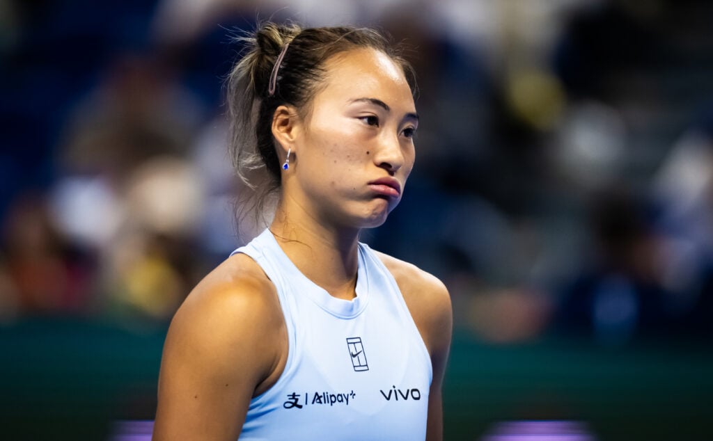 Qinwen Zheng looks on during her match at the 2025 China Open.