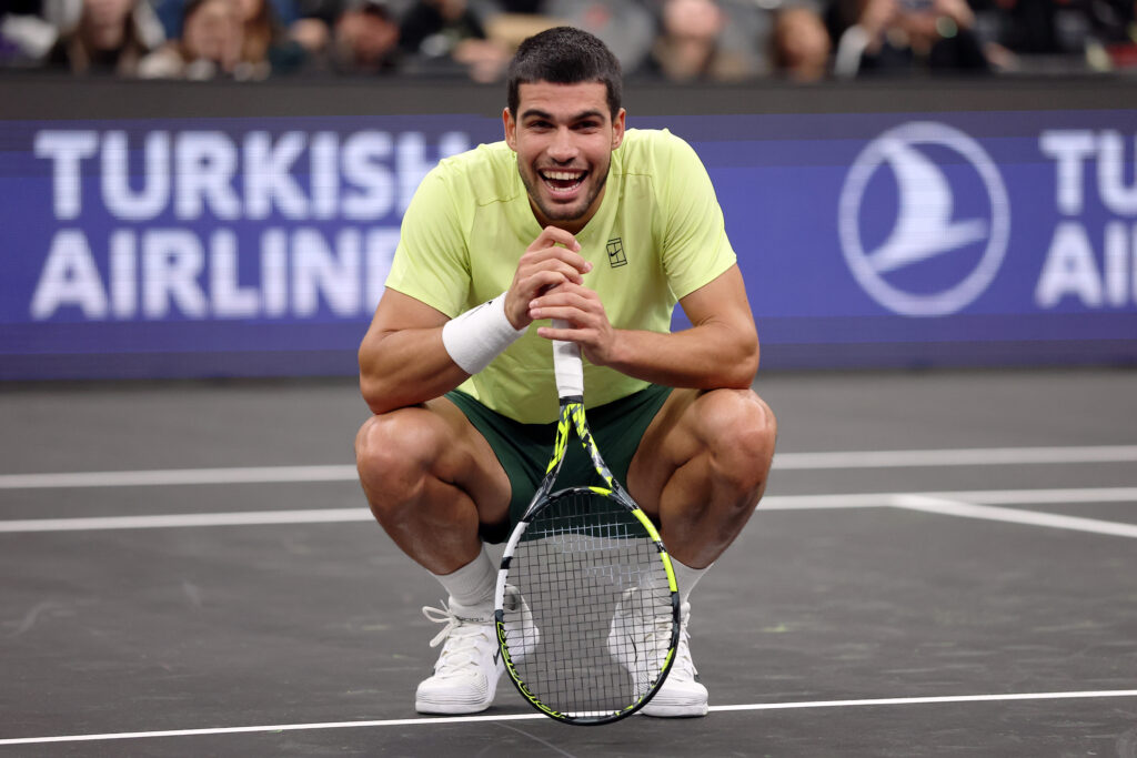 Carlos Alcaraz reacts during the 'A Racquet At The Rock' exhibition in 2025
