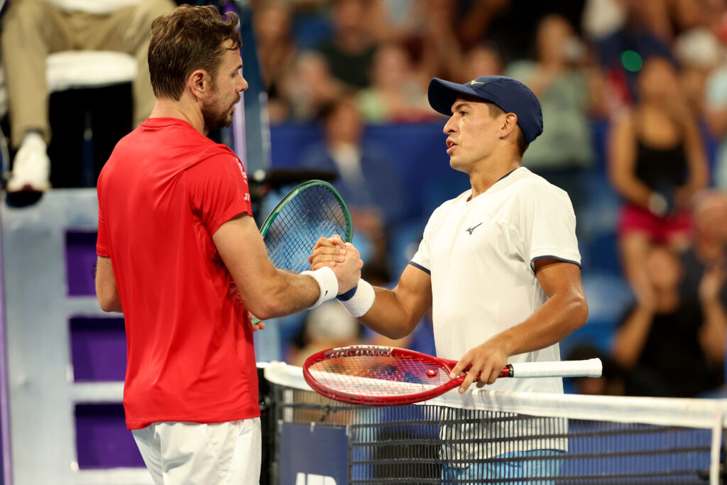 Stan Wawrinka and Sebastian Baez shake hands after their match at the 2026 United Cup