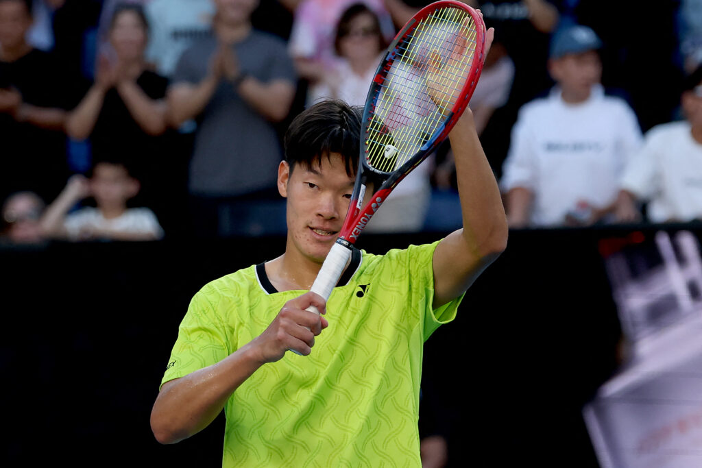 Michael Zheng celebrates his victory over Sebastian Korda at the 2026 Australian Open.