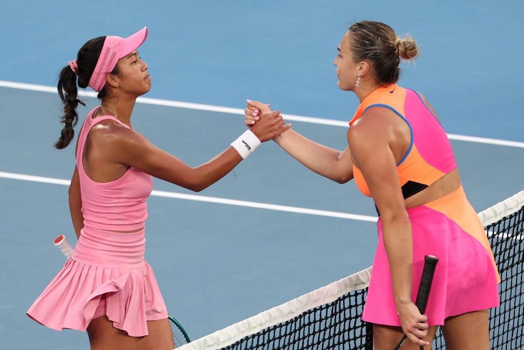 Aryna Sabalenka shakes hands with Rajaonah Rakotomanga
