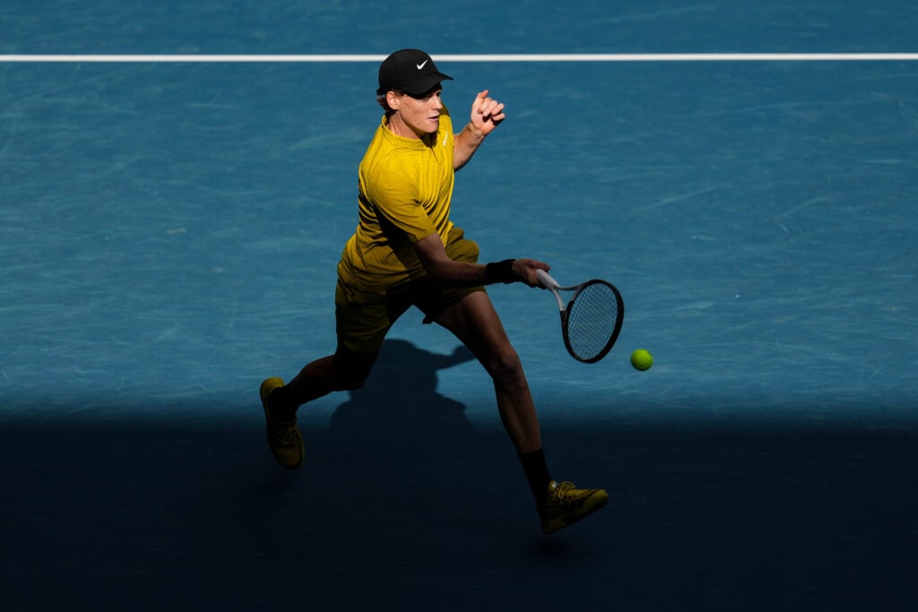 Jannik Sinner hits a shot to Felix Auger-Aliassime ahead of the 2026 Australian Open