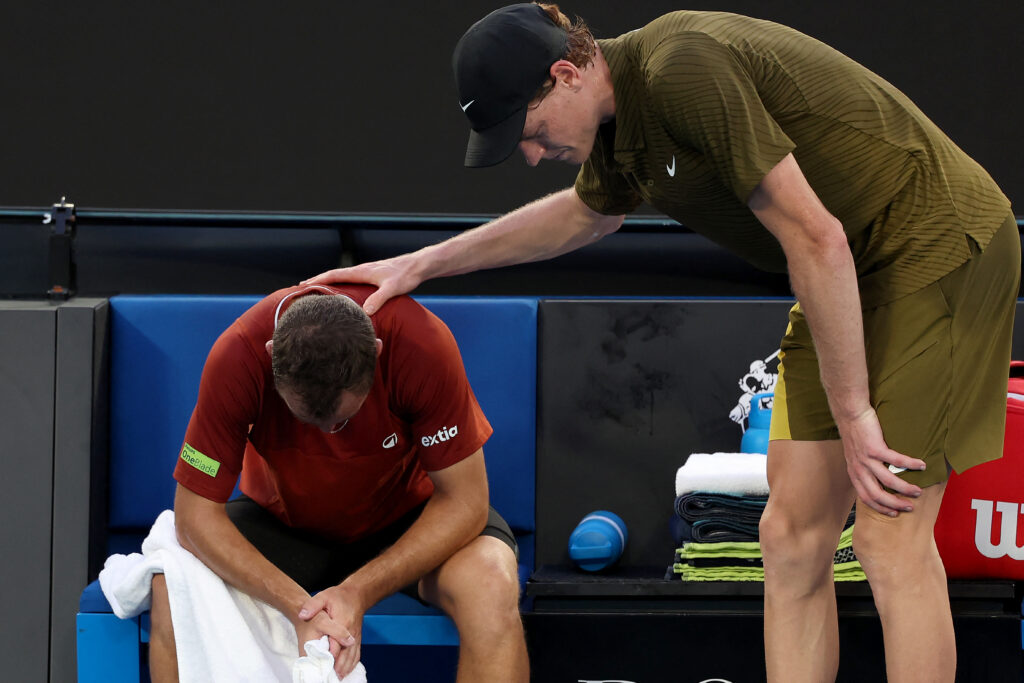 Jannik Sinner comforts Hugo Gaston after their match at the 2026 Australian Open
