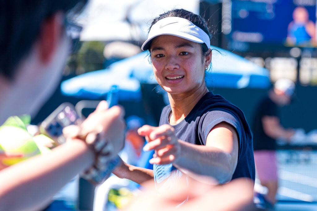 Alexandra Eala signs autographs ahead of the 2026 Australian Open