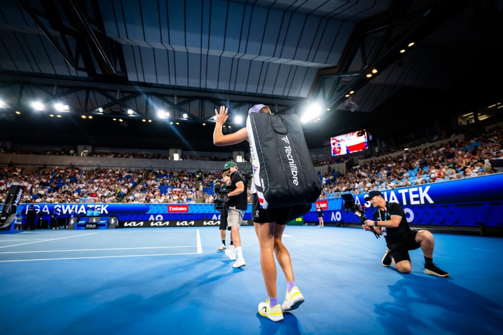 Iga Swiatek walks onto the court at the 2026 Australian Open.