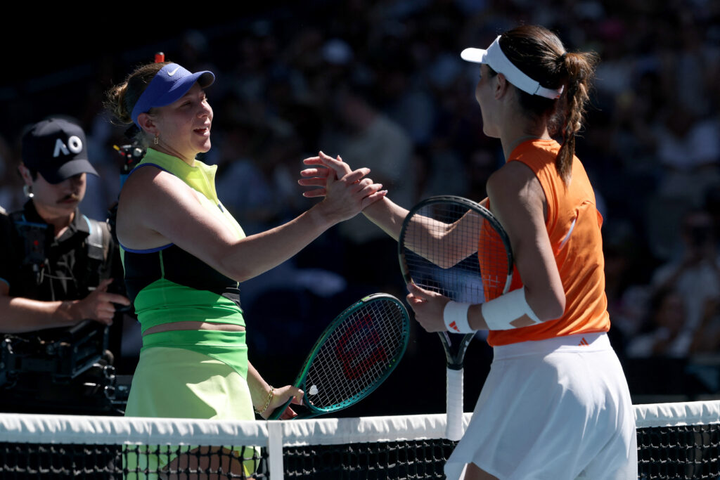 Amanda Anisimova shakes hands with Xinyu Wang after beating her at the 2026 Australian Open.