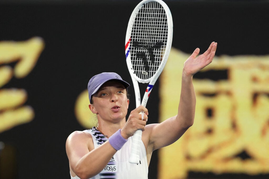 Iga Swiatek acknowledges the crowd at the Australian Open.