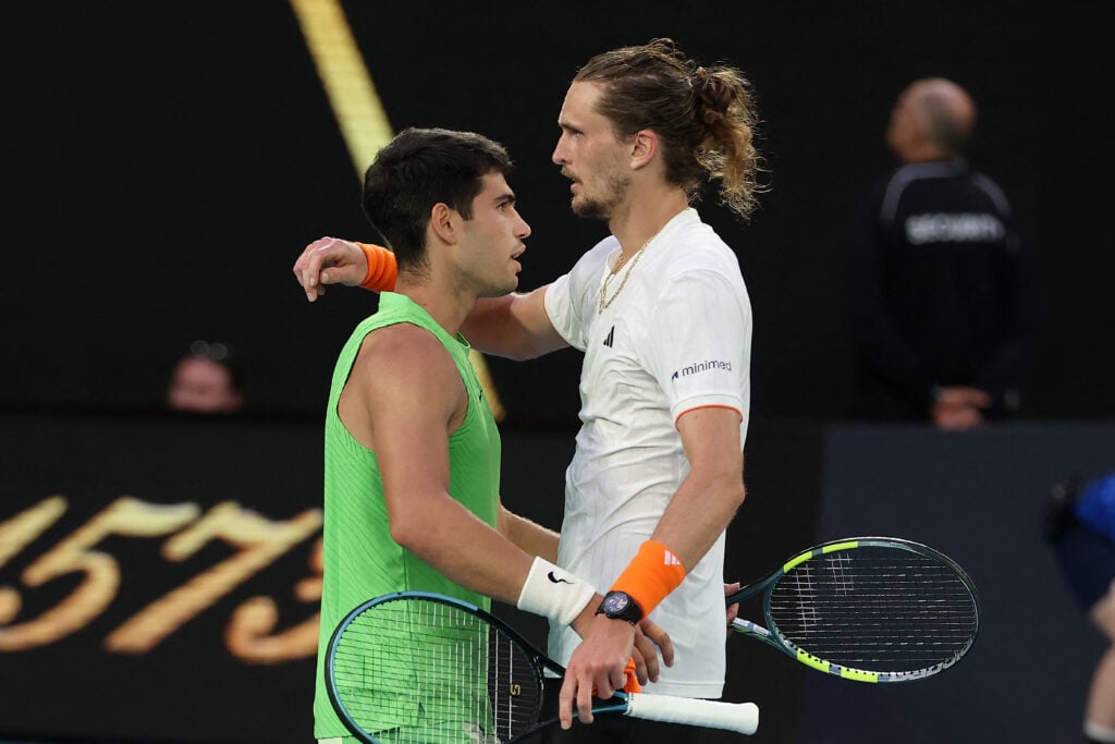 Carlos Alcaraz and Alexander Zverev embrace after their 2026 Australian Open semifinal
