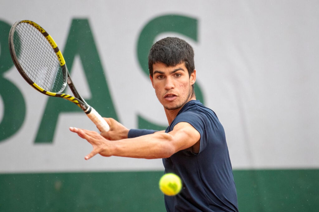 Carlos Alcaraz in action during qualifying at the 2021 French Open.