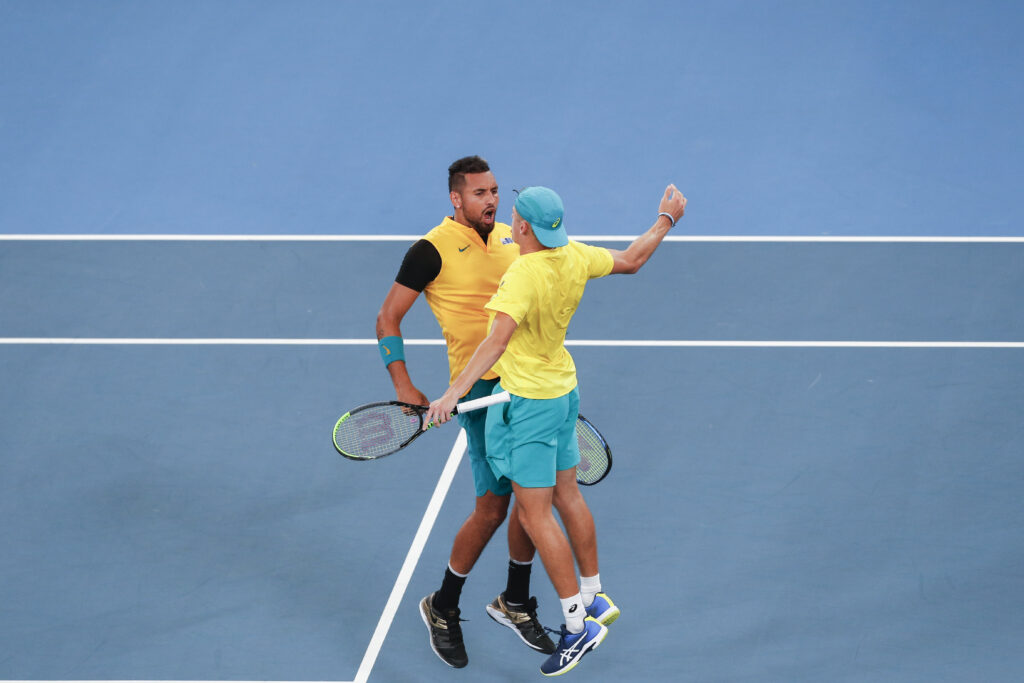 Nick Kyrgios and Alex de Minaur celebrate.