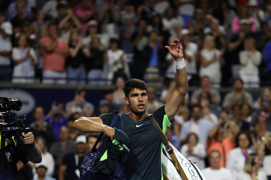 Carlos Alcaraz waves to the crowd in Toronto.