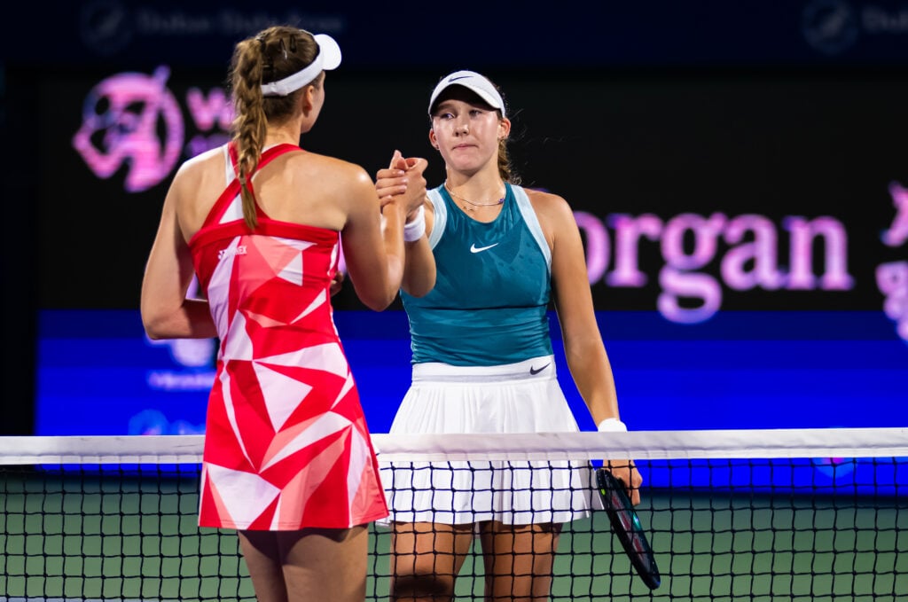 Elena Rybakina and Mirra Andreeva shake hands after their semifinal match at the 2025 Dubai Tennis Championships