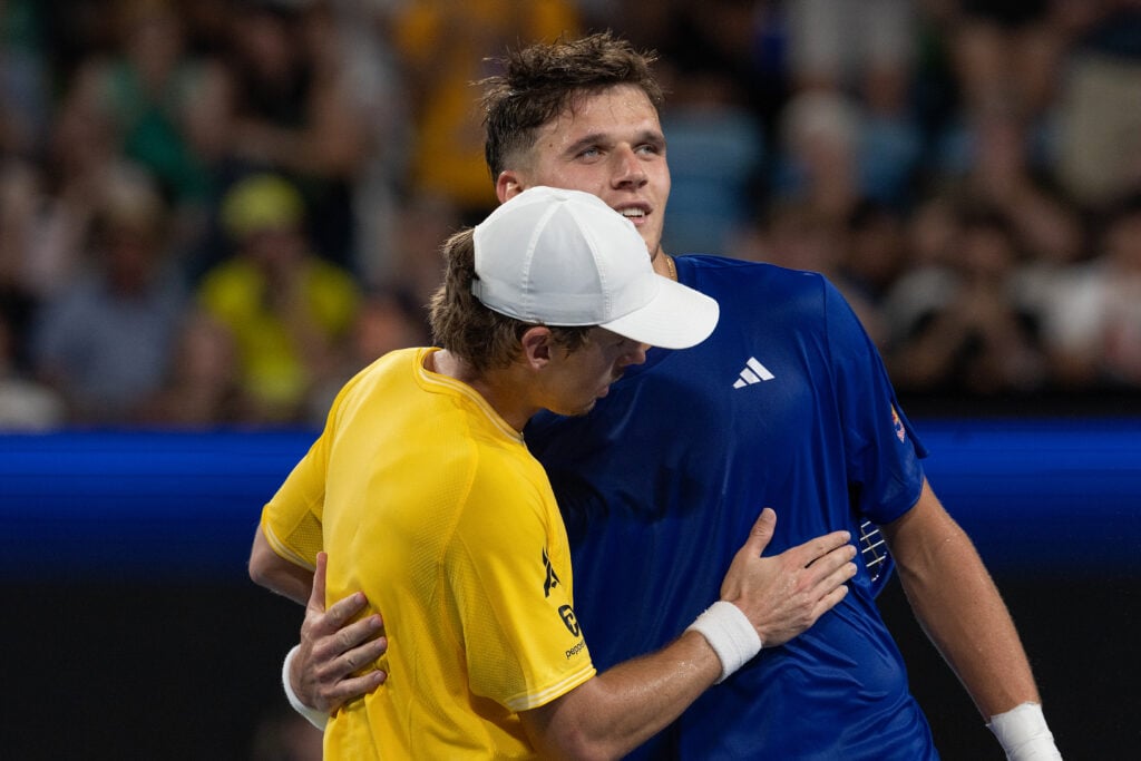 Alex de Minaur and Jakub Mensik embrace.