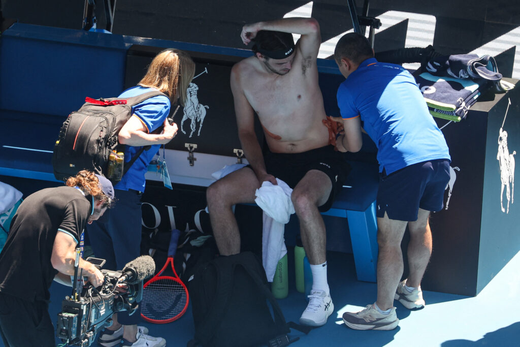 Taylor Fritz receives medical attention