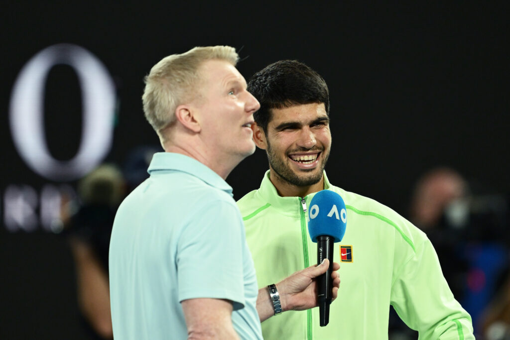 Carlos Alcaraz is interviewed by Jim Courier after beating Alex de Minaur at the 2026 Australian Open.
