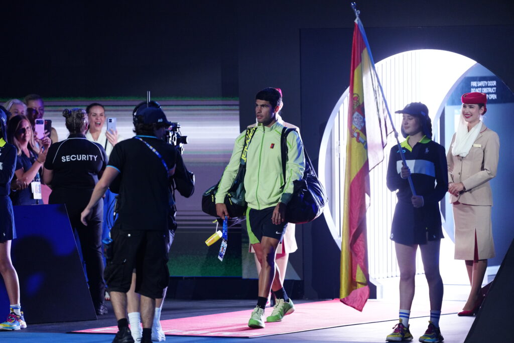 Carlos Alcaraz walks onto the court at the 2026 Australian Open.