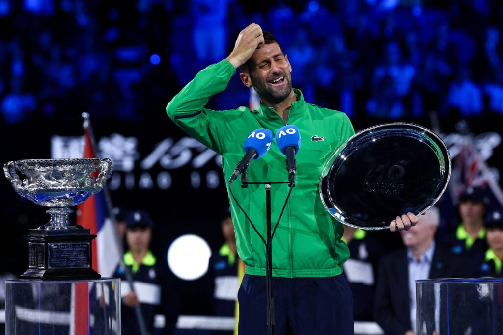 Novak Djokovic laughs during his runner-up speech at the Australian Open.