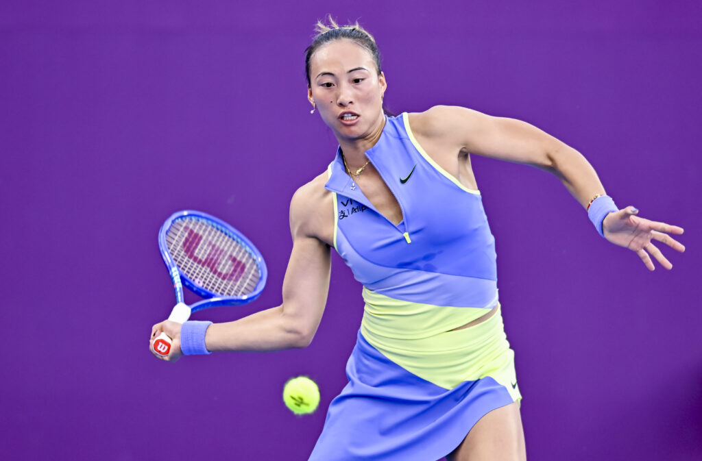 Qinwen Zheng hits a forehand at the 2026 Qatar Open.