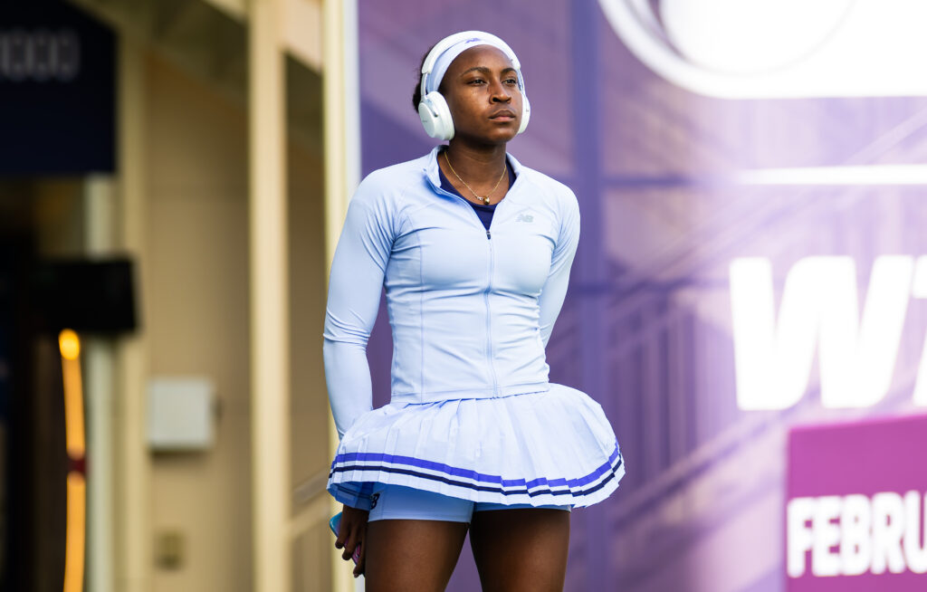 Coco Gauff standing ahead of her match against Elisabetta Cocciaretto at the 2026 Qatar Open.