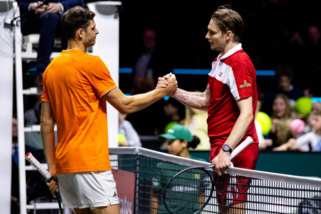 Hubert Hurkacz shakes hands with Alexander Bublik after their match at the 2026 Rotterdam Open.