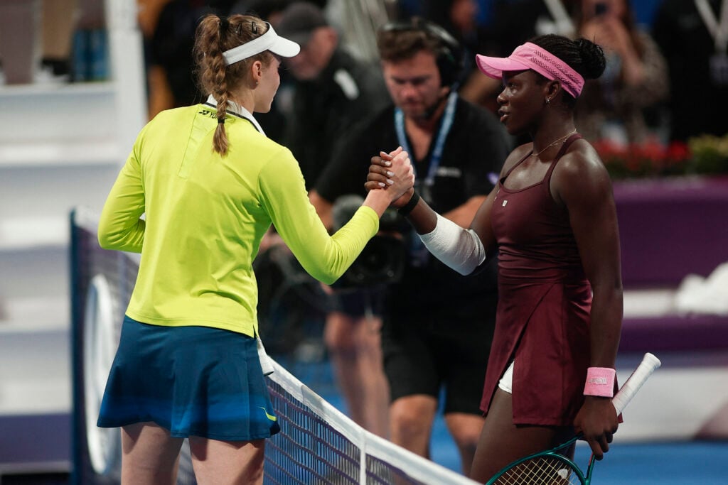 Elena Rybakina and Victoria Mboko shake hands after their match at the 2025 Qatar Open