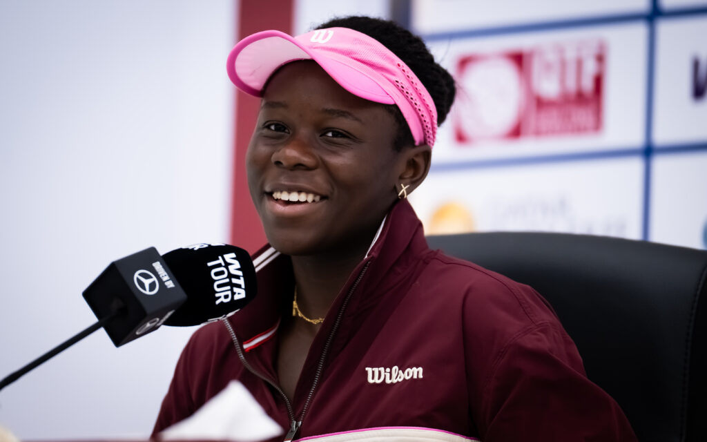 Victoria Mboko smiles at a Qatar Open press conference.